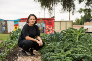 Anya Sirota, an associate professor of architecture at the University of Michigan Taubman College of Architecture and Urban Planning, has been working more than four years to help make the Oakland Avenue Urban Farm self-sufficient and sustainable. To buy the six acres the farm operates on, she studied speculators in Detroit and then spend two years gathering the property for the farm’s land trust with help from investors and grants. Image credit: Michigan Photography