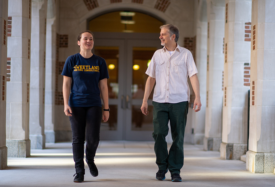 Photo of student Anna Horton walking with LSA lecturer Louis Cicciarelli