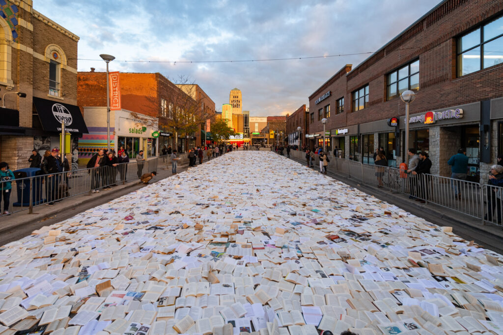 Books laid out open on Liberty Street in Ann Arbor.