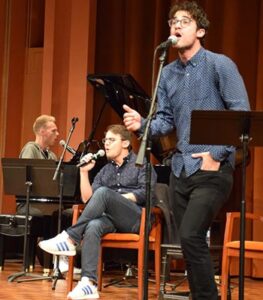 Justin Paul, BFA '06, Benj Pasek, BFA '06, and Darren Criss, BFA '09,