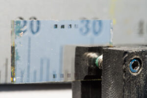 A research team led by University of Michigan physicists have developed a way to generate synchrotron using a device the size of a match head. Typically, synchrotron radiation is generated at facilities the size of several football fields. Image credit: Austin Thomason, Michigan Photography