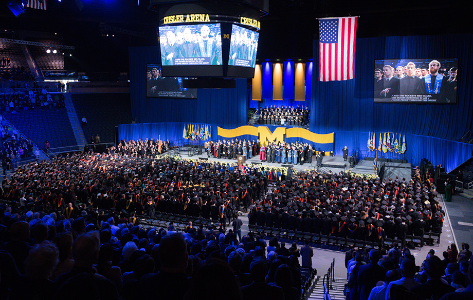 Photo fo the Winter Commencement graduates and audience at Crisler Center