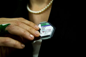 Sara Pozzi adjusts the tag that monitors her exposure to radiation in the laboratory. Image credit: Joseph Xu, Michigan Engineering
