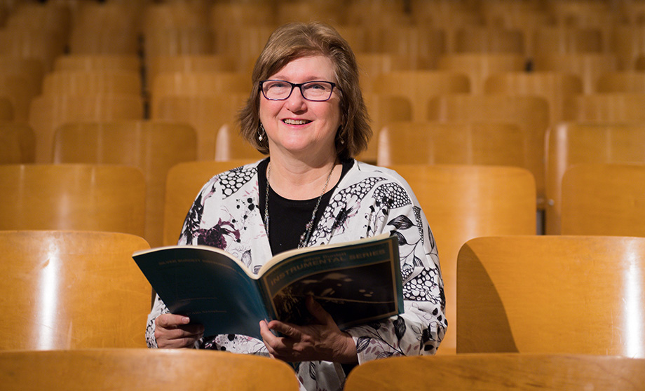 Photo of Victoria Bigelow with a music book