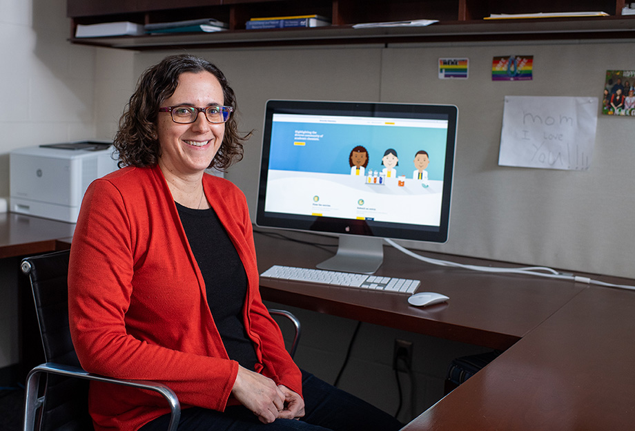 Photo of Anne McNeil, Arthur F. Thurnau Professor and professor of chemistry, at her computer