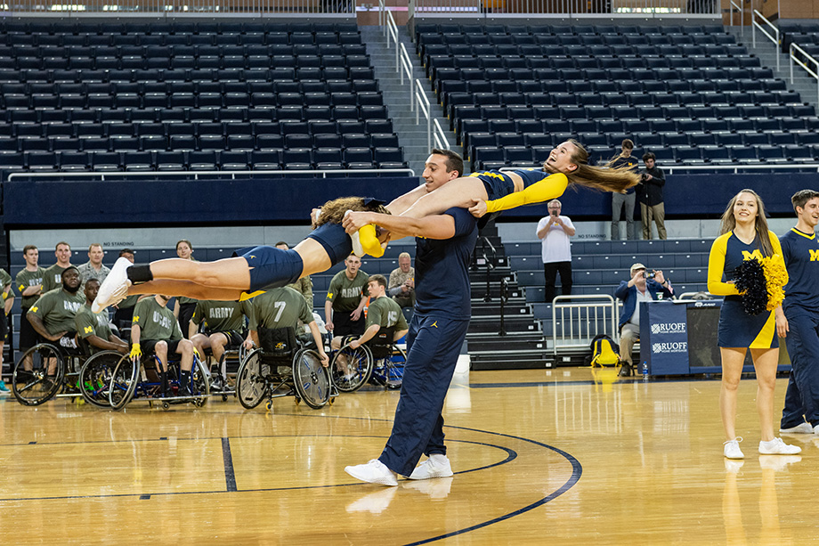 Photo of cheerleaders at wheelchair basketball game