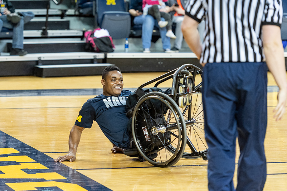 Photo of Navy player taking a tumble