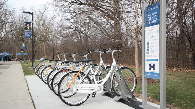 Photos of bikes at a bike-sharing station at UM-Dearborn