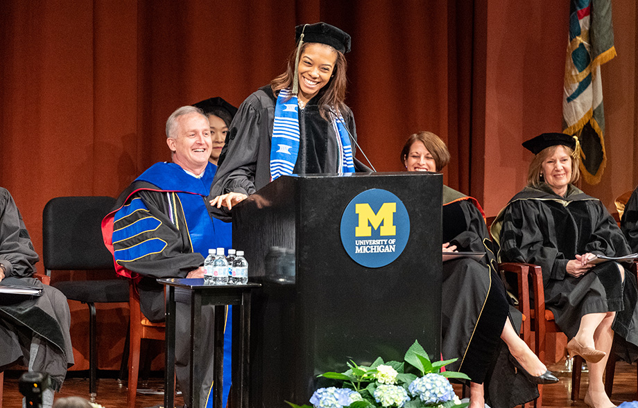 Photo of Krystal Holmes speaking at the College of Pharmacy ceremony