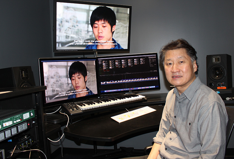 Photo of David Chung in the editing room
