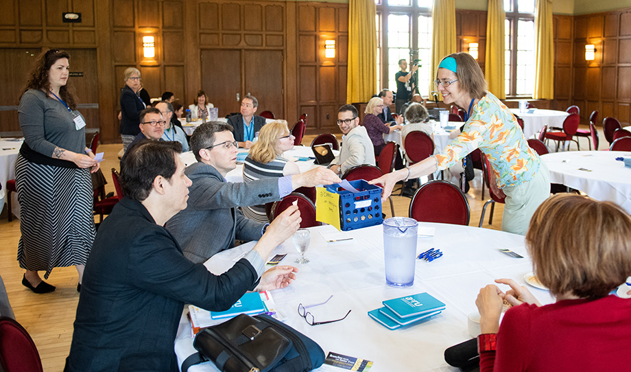Photo of people participating in an exercise during the town hall