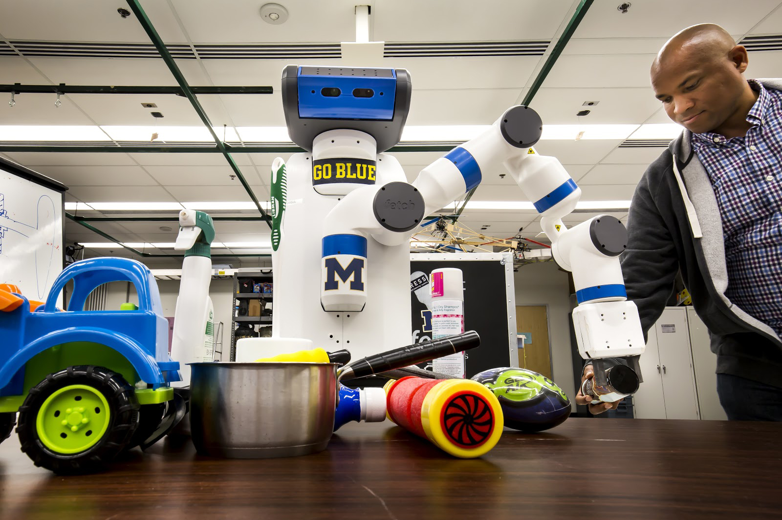 Odd Job, one of two robots in CSE Associate Professor Chad Jenkin's lab, grabs for an object. Odd Job and its double, Cookie, currently are able to grab objects based on depth and color perception. Image credit: Joseph Xu, Michigan Engineering