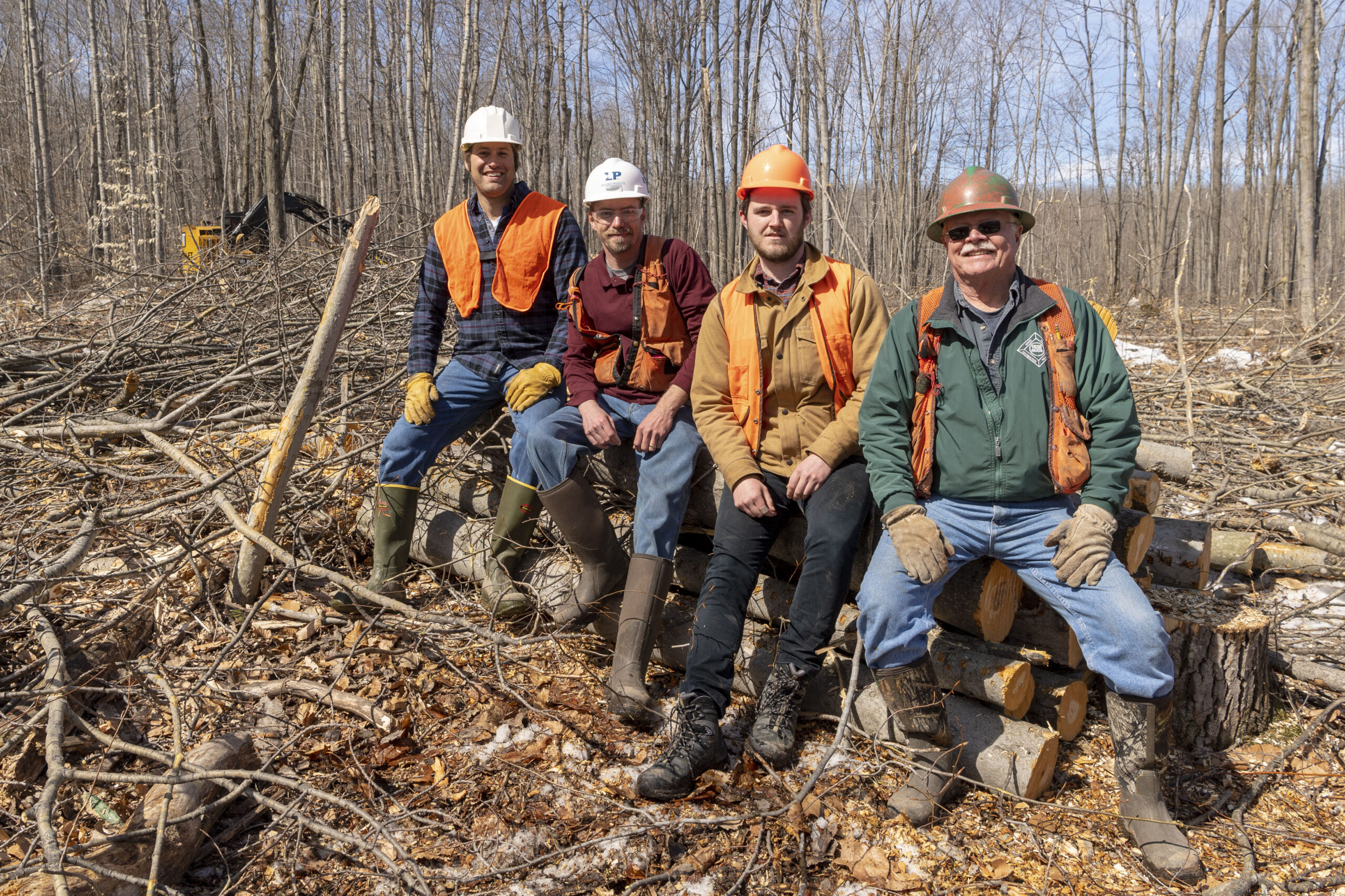 From left, U-M ecologist and biogeochemist Luke Nave; Travis Kangas, a resource manager at Louisiana-Pacific Corporation; U-M research specialist John Den Uyl; and Dean Reid, the consulting forester who set up the timber sale. Image credit: Roger Hart, Michigan Photography