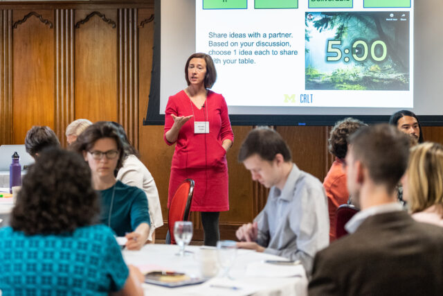 Photo of Nicole Tuttle, assistant director of the Center for Research on Learning and Teaching, leading a discussion.