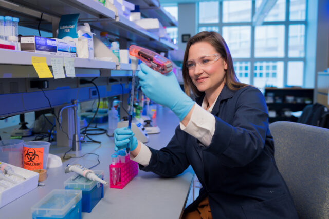 Alison Narayan, William R. Roush Assistant Professor and assistant professor of chemistry, works in her lab.