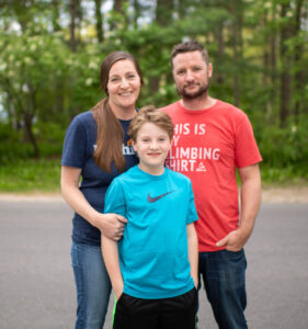 Rhys and his parents. Image credit: Eric Bronson, Michigan Photography
