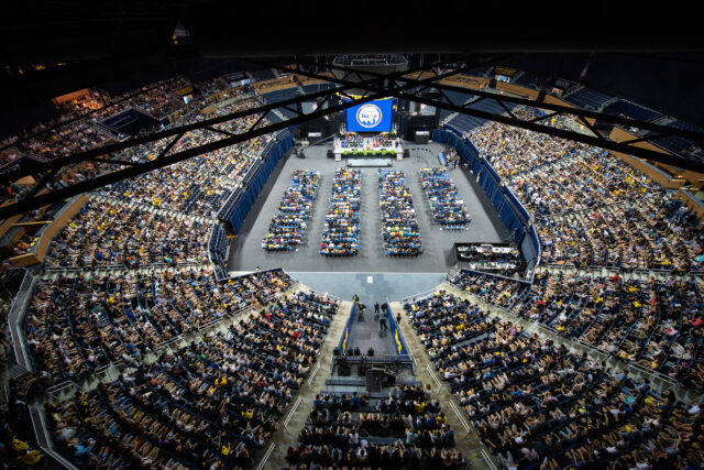 New students, family members and others attend the New Student Convocation on Aug. 30 at Crisler Arena.