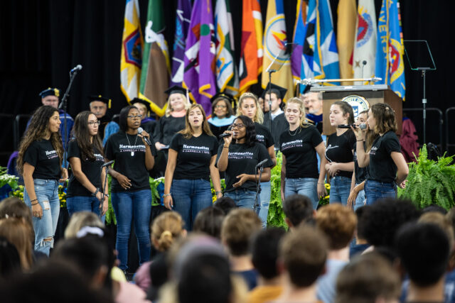 The Harmonettes, U-M's all-woman student a cappella group, perform for the convocation audience.