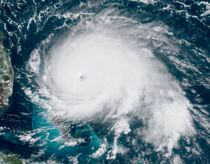 Hurricane Dorian at peak intensity as a Category 5 hurricane making landfall on the Abaco Islands in the Bahamas, September 1, 2019. In the left of the image is the coast of Florida. Image courtesy National Oceanic and Atmospheric Administration's GOES-East
