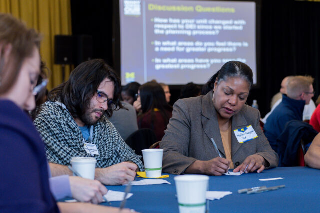 From left, Frank Suarez-Roman, assistant director of annual giving for Matthaei Botanical Gardens and Nichols Arboretum, and Monita Thompson, co-director of the Program on Intergroup Relations, were among those who participated in a small-group discussion.