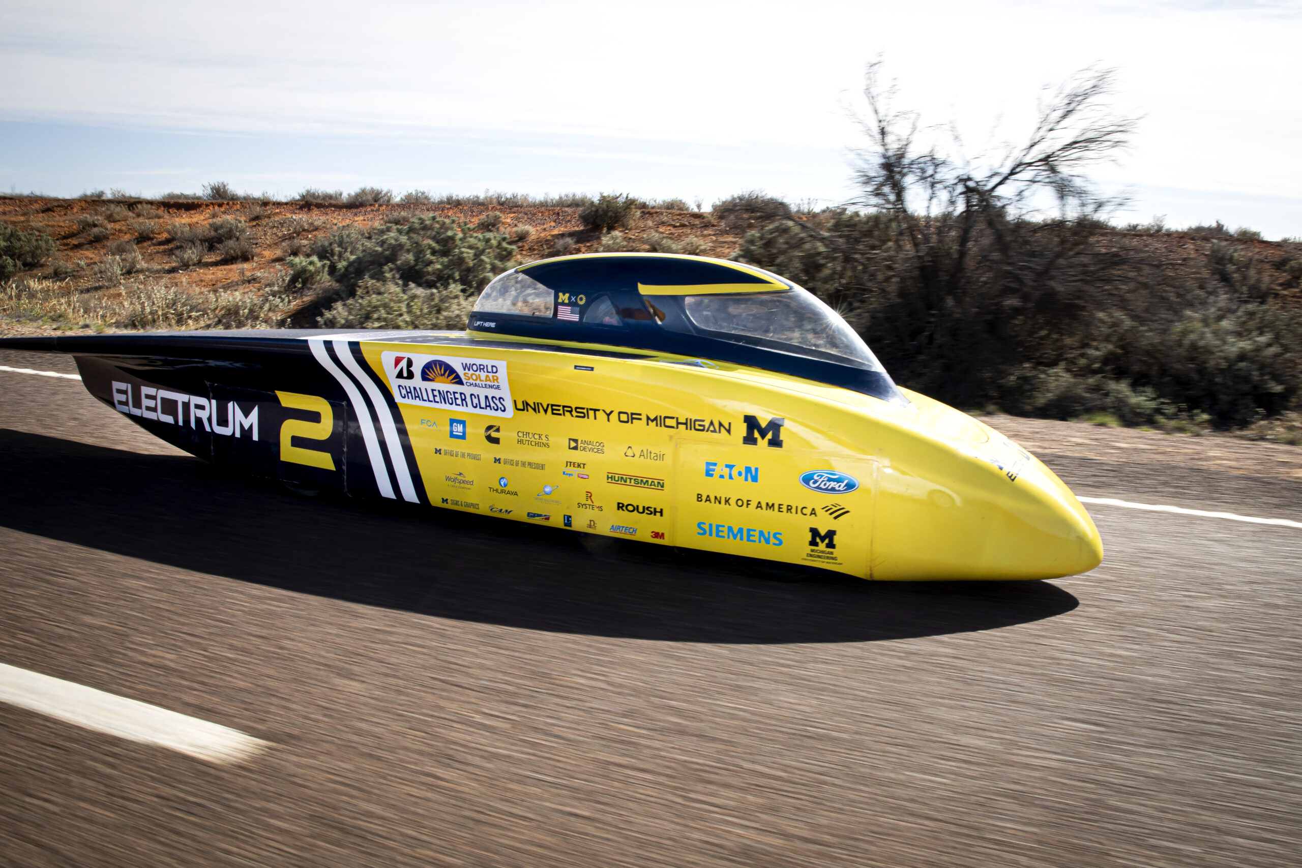Electrum cruises down Australia’s Stuart Highway in third place on the final day of racing. Photo: Joseph Xu/Michigan Engineering