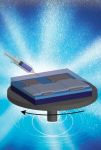 An illustration of a step in the production process, injecting the zinc-tin-solution atop the spinning silicon chip. Image credit: Youngbae Son and Rose Anderson, Peterson Lab, University of Michigan