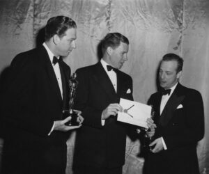 Valentine Davies and others backstage at the Oscars.