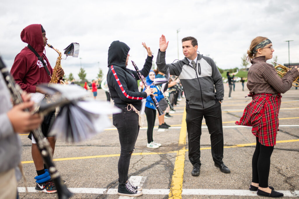 This is Michigan, Stories of our state. Northwest Band in Jackson. Director and student high five.