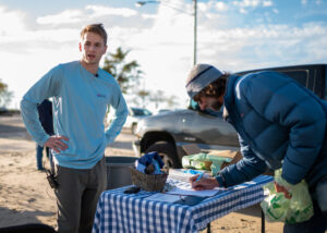 Beach cleanups have collected 300 lbs. of waste. Image credit: Eric Bronson, Michigan Photography