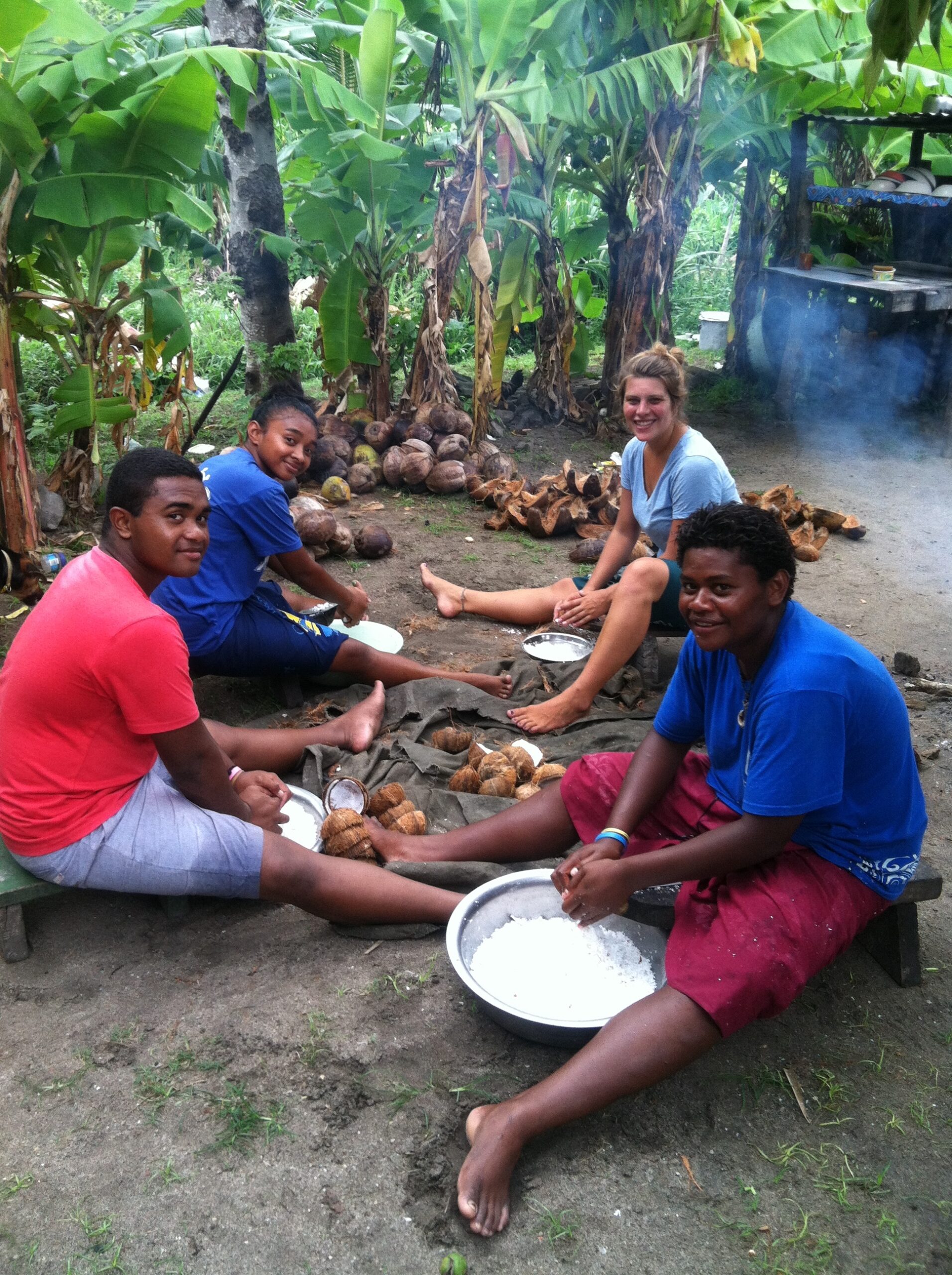 Kline cooking with some local community members. Image credit: Peace Corps Students
