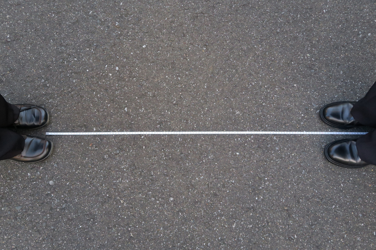 Social distancing (with a measure). Image credit: iStock
