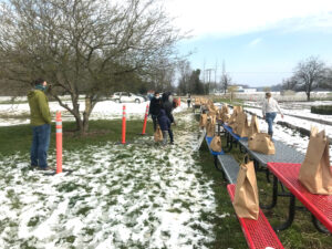 Customers pick up online orders at White Lotus Farms. Image credit: Hans Anderson