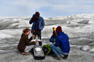 Abby Meyer and colleagues packing up a drone. Image credit: Personal Archive