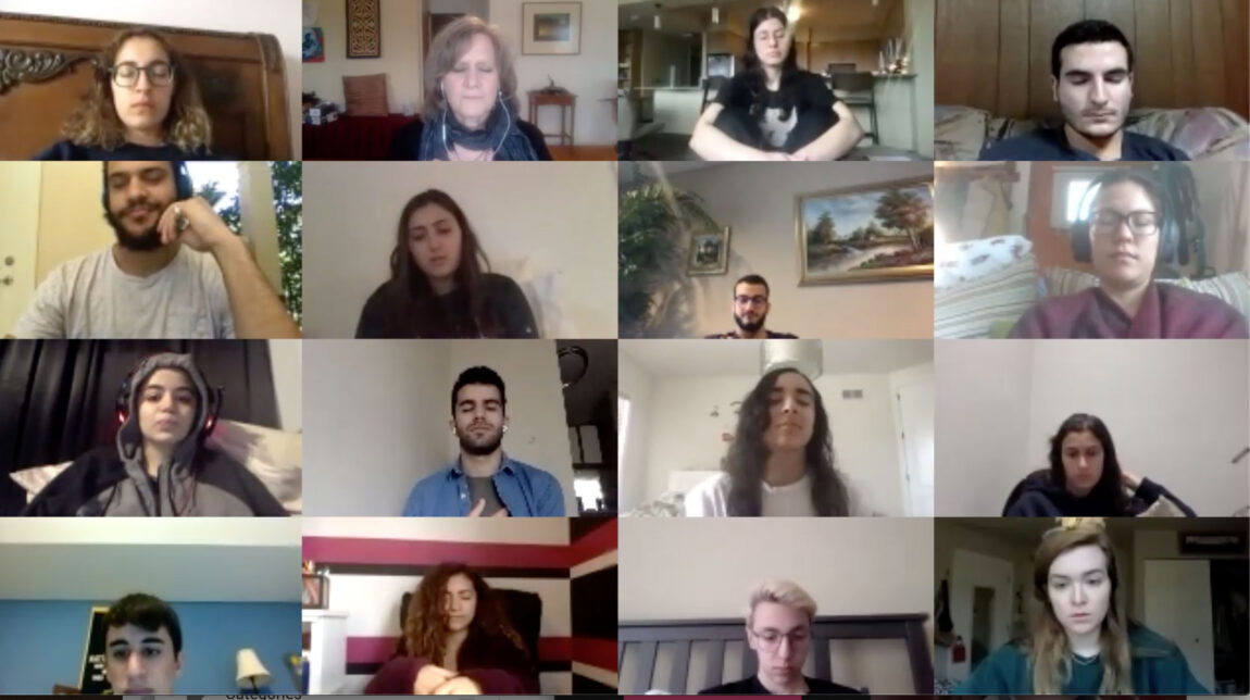 Carol Bardenstein, second from top left, associate professor of Arabic literature and culture, leads a class through a brief breathing and guided meditation session via Zoom. (Photo courtesy of Carol Bardenstein)