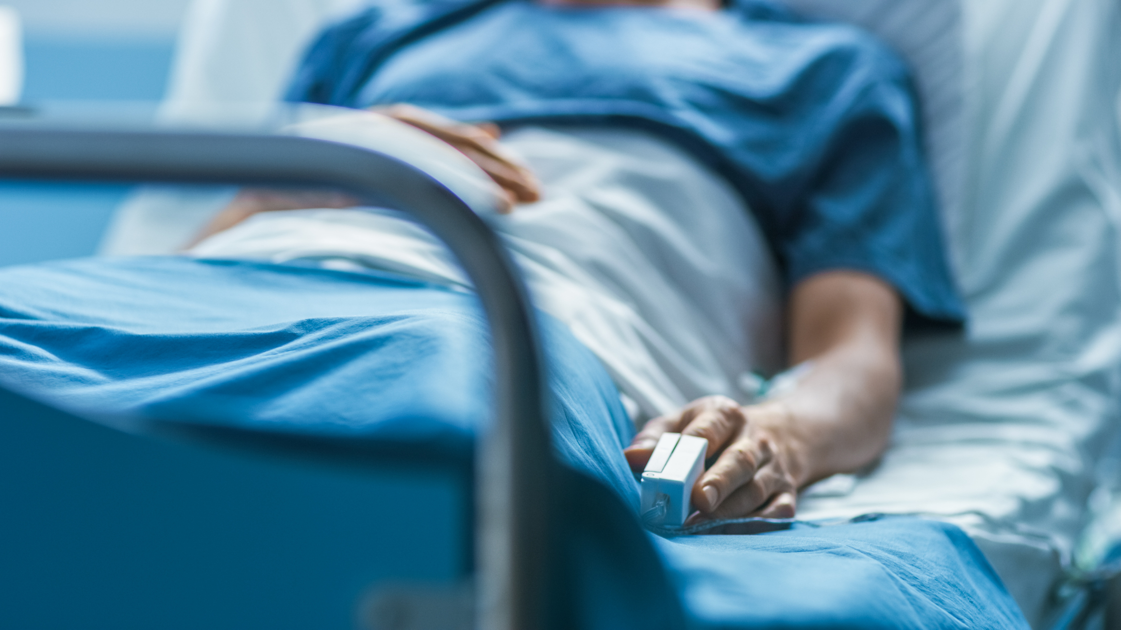 Hospital patient alone in bed. Image credit: iStock