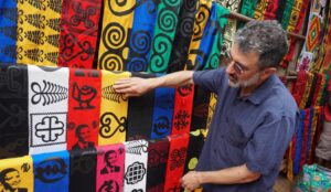 Ron Eglash, a professor at the University of Michigan School of Information and Penny W. Stamps School of Art and Design, discusses fractal patterns on African textiles during the filming of "Enslaved." Image credit: Ron Eglash. 