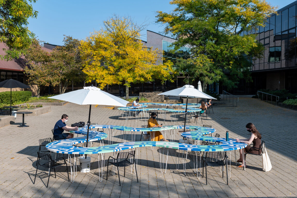 The tables fit together to provide clover-shaped work spaces at the Art and Architecture Building's inner courtyard.