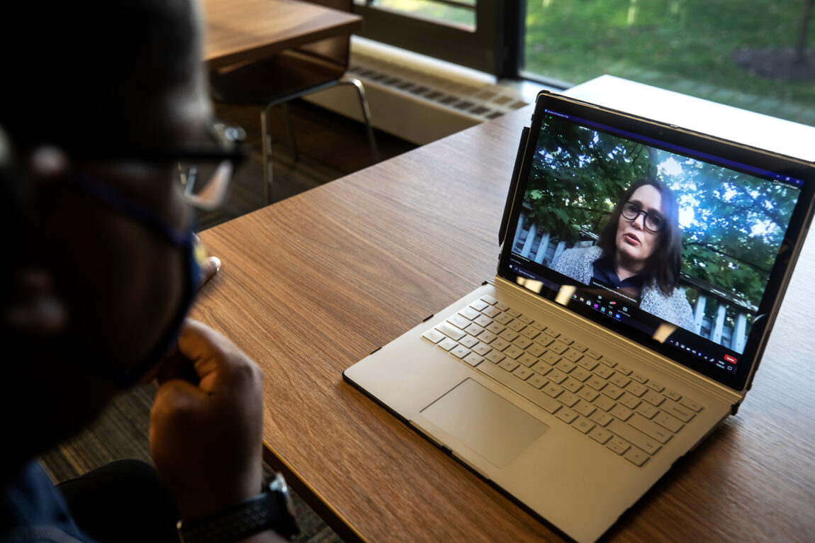 Photo of William Spraggins watching the CoE DEI webinar.