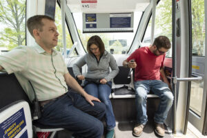 Riders on the Mcity Driverless Shuttle at the University of Michigan must wear seat belts at all times. A conductor is on board for emergency situations. Image credit: Roger Hart, Michigan Photography