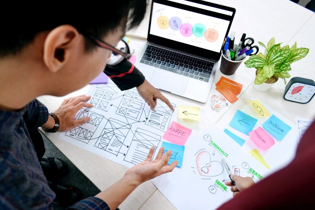 A group working on a design project. Image credit: UnSplash.com