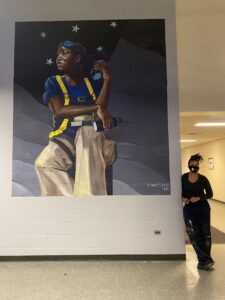 "Sarah the Whatevershechoosestobe-(h)er" by Sydney James (pictured) is a new mural on view in the lobby of the University of Michigan's Modern Languages Building. It was completed in October 2020. Image credit: Amanda Krugliak