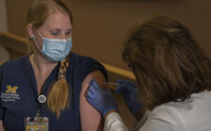 Michigan Medicine Nurse Elissa Spedoske receives COVID-19 vaccine