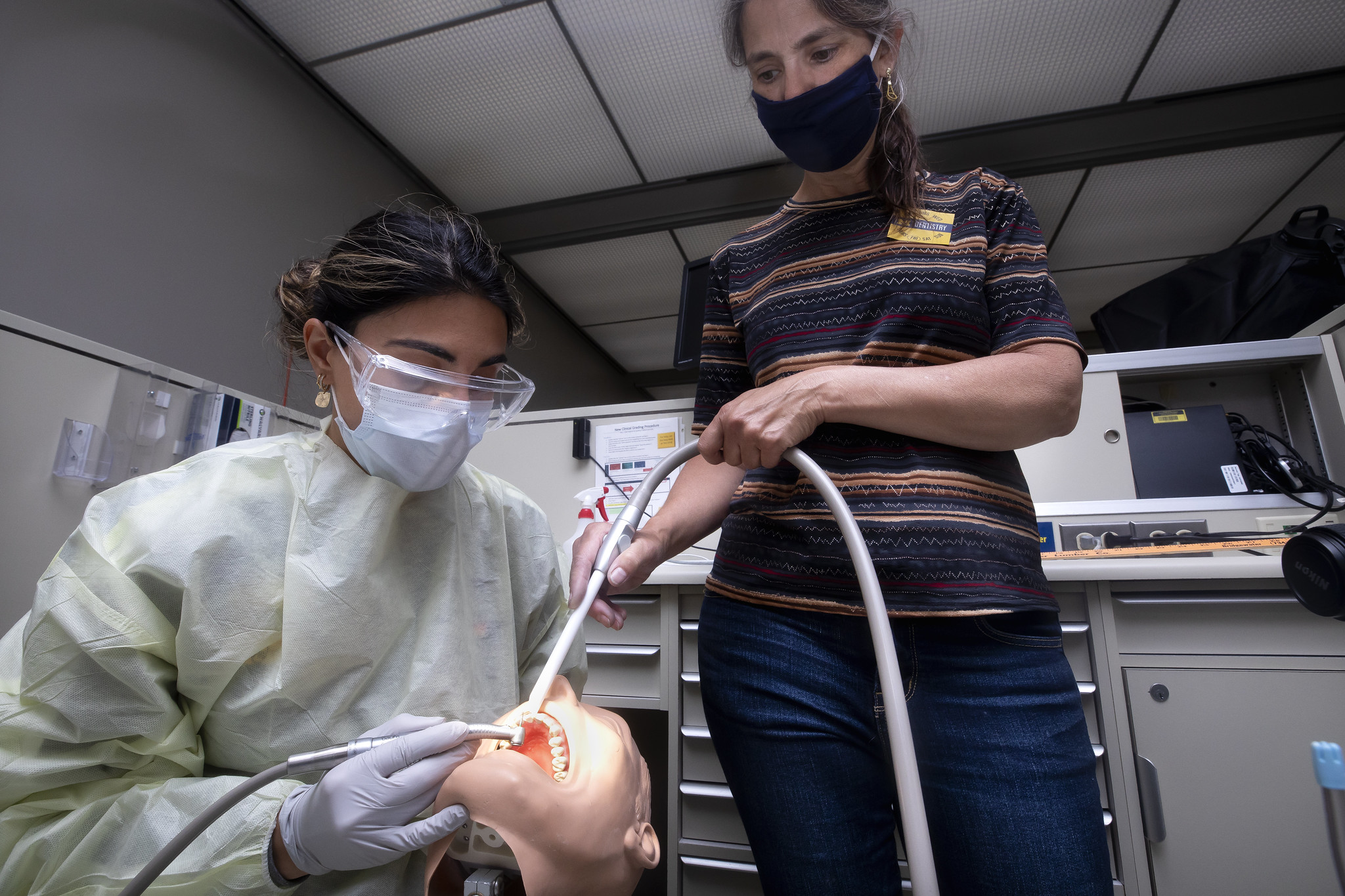 Viyan Kadhium, School of Dentistry researcher, and Margaret Wooldridge, Arthur F Thurnau Professor and Professor of Mechanical Engineering, run an experiment to map and understand the aerosolization of particles. Image credit: Joseph Xu, Michigan Engineering