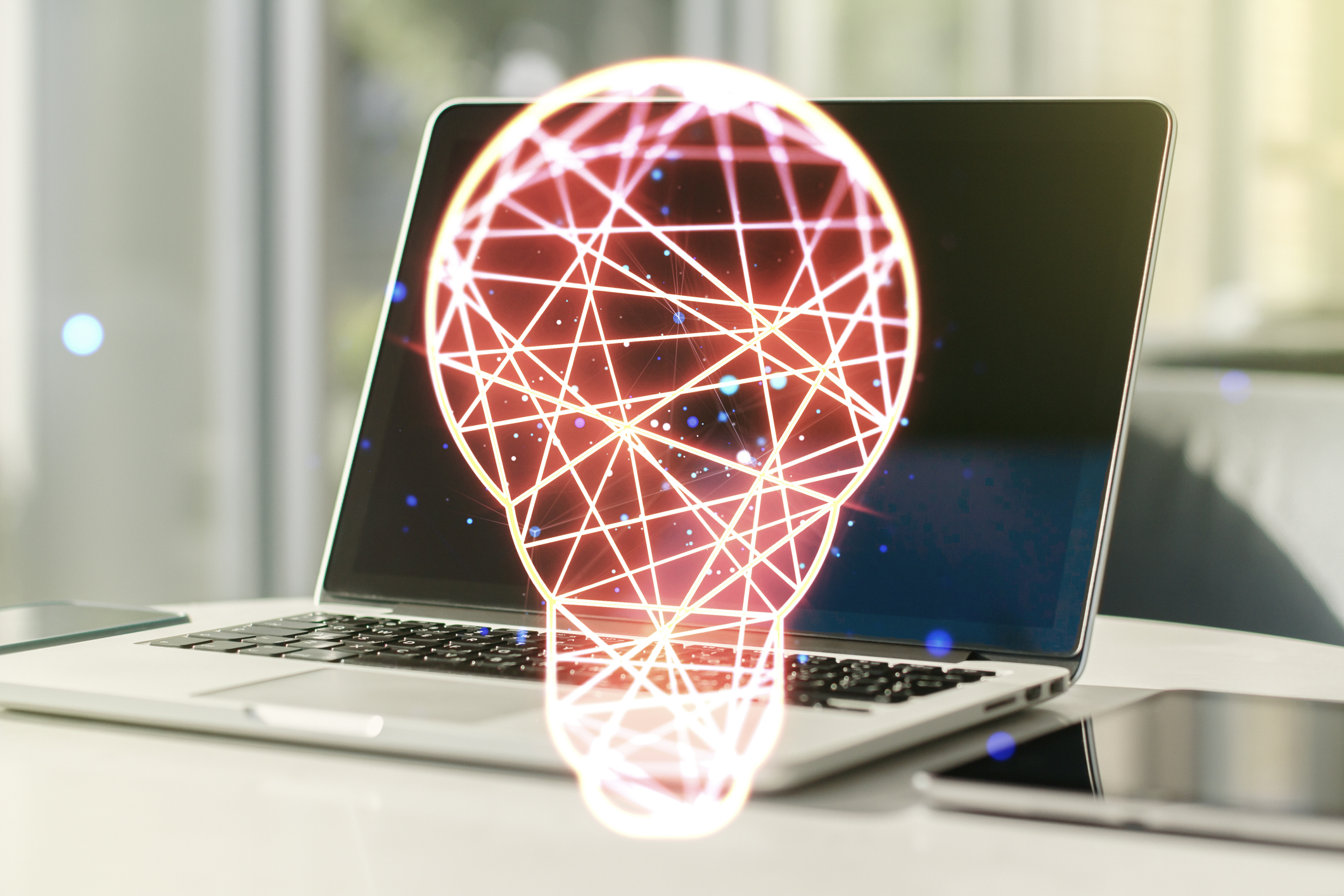 Creative idea concept with light bulb illustration on modern laptop background. Multiexposure. Image credit: iStock