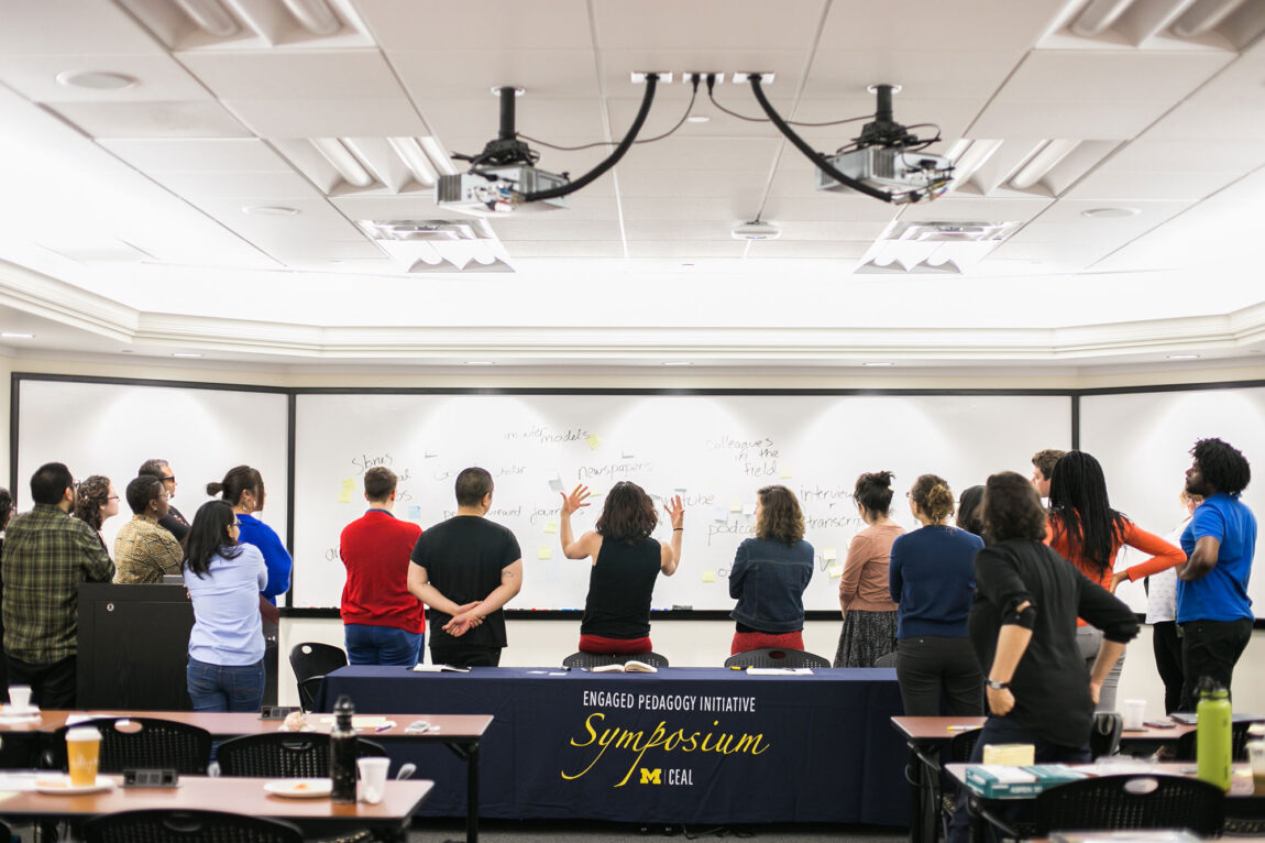 Photo of students leading discussions of tactics in community-based learning at the 2016 Engaged Pedagogy Initiative Symposium.