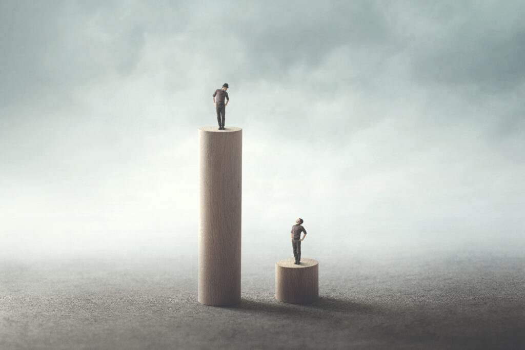 Abstract equality concept between two men. Image credit: iStock