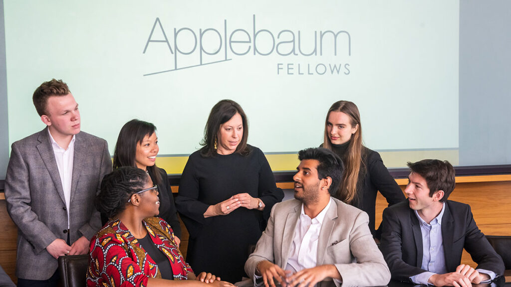 A group of students in front of Applebaum Fellows sign. Image courtesy: U-M Ross School.
