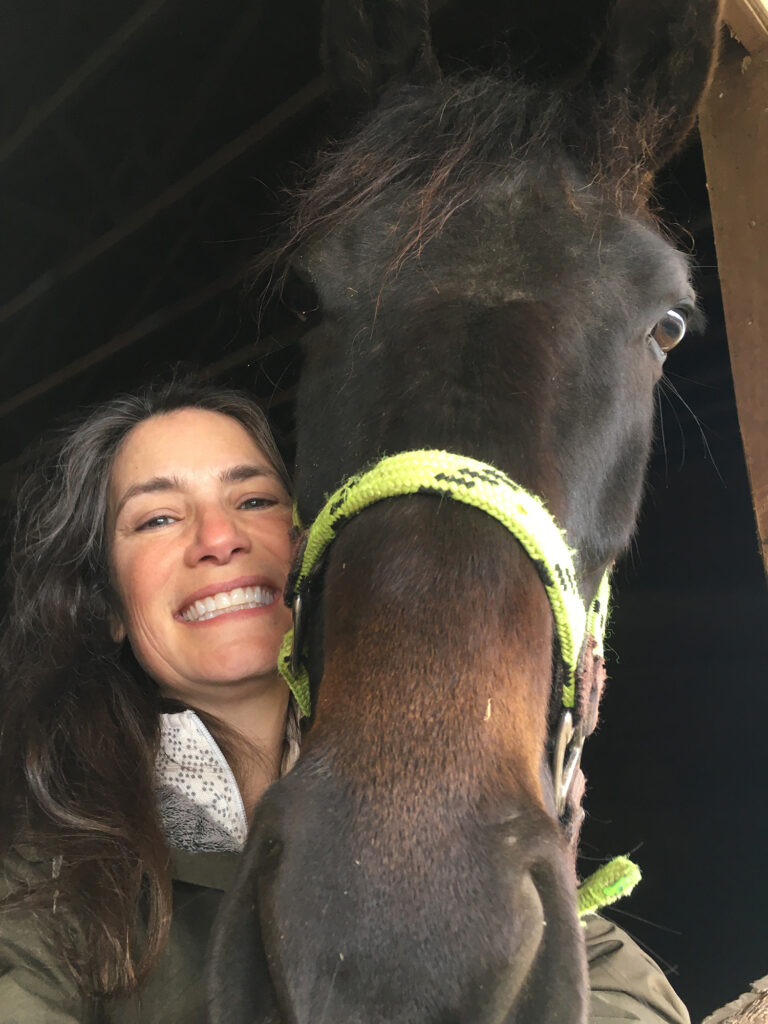 Margaret Wooldridge poses with one of her horses, Cleopatra. (Photo courtesy of Margaret Wooldridge)