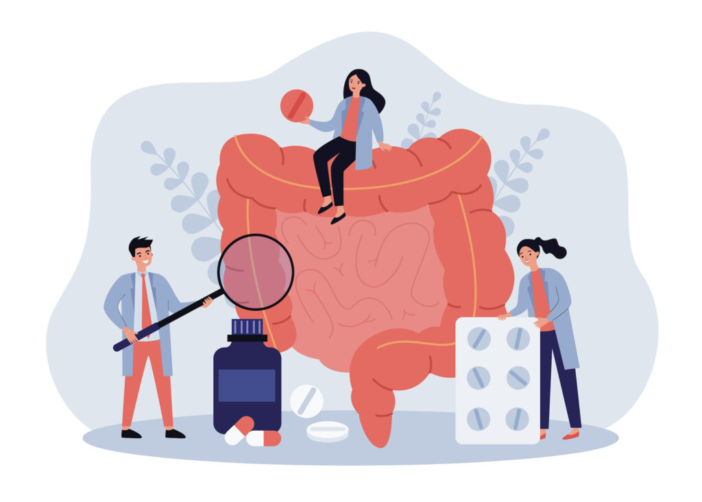 Tiny doctors checking and treating large intestine flat vector illustration. Cartoon inflammation in digestive system. Medicine and health concept