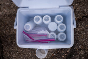 A team of researchers at the University of Michigan School of Public Health are collecting samples from sewage, wiping down classrooms and buses, and making measurements of air looking for novel coronavirus on campus to determine how much virus is present in the environment, and whether that has any relationship to COVID-19 infection rates within the campus community.